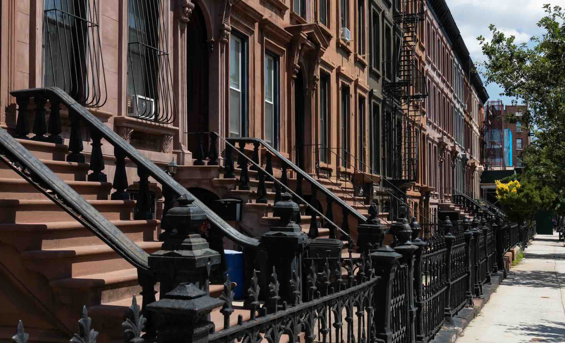 row of brownstones and fences bigger size 1